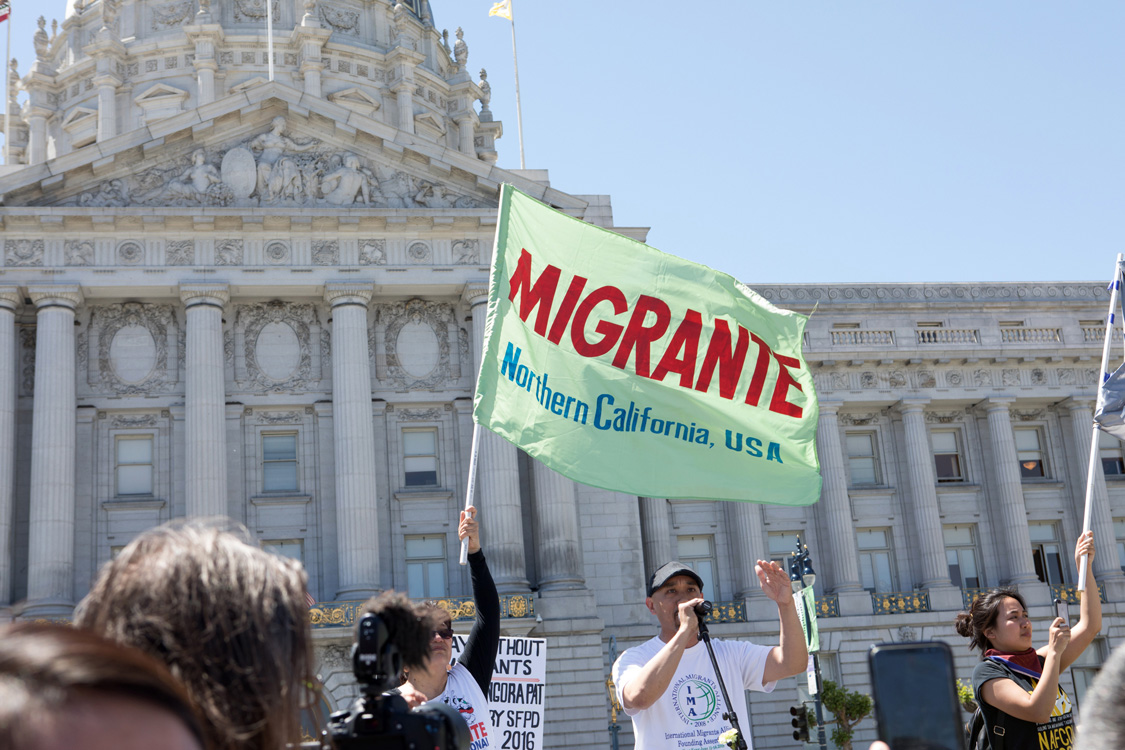 Flag in front of SF City Hall. Photo by Sam Murphy.