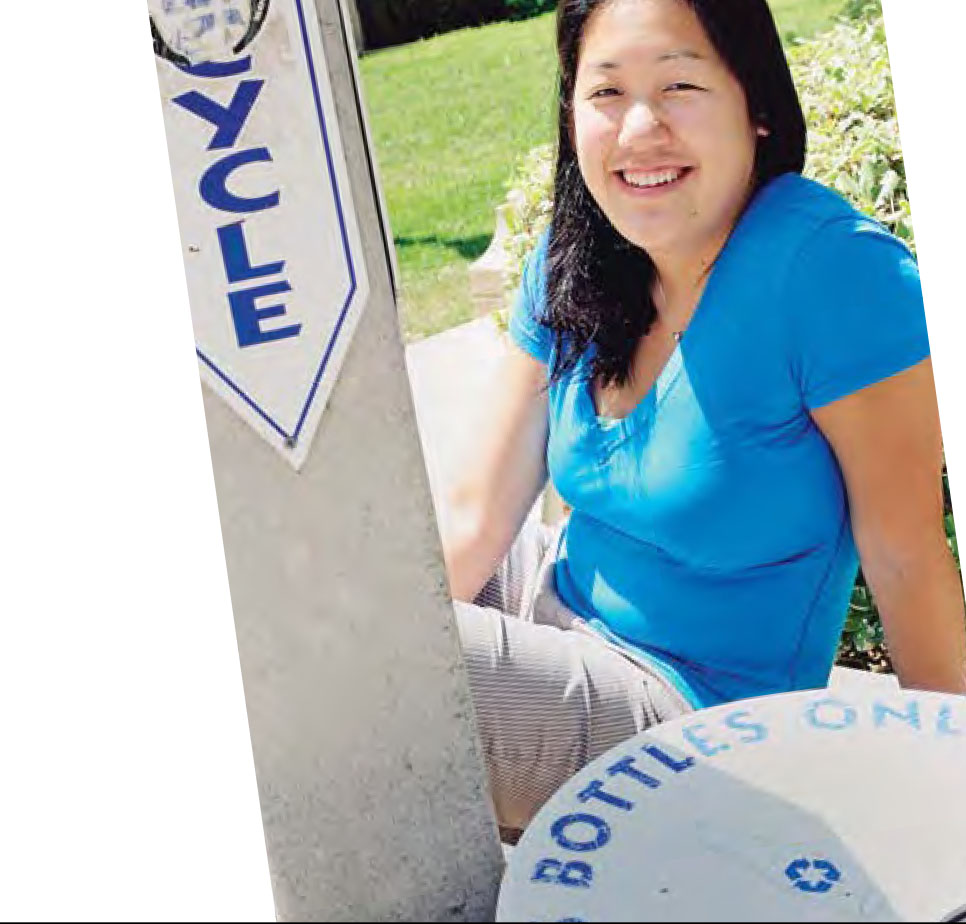 Audrey Kuo appreciating one of the many recycling centers on Bruin Walk.