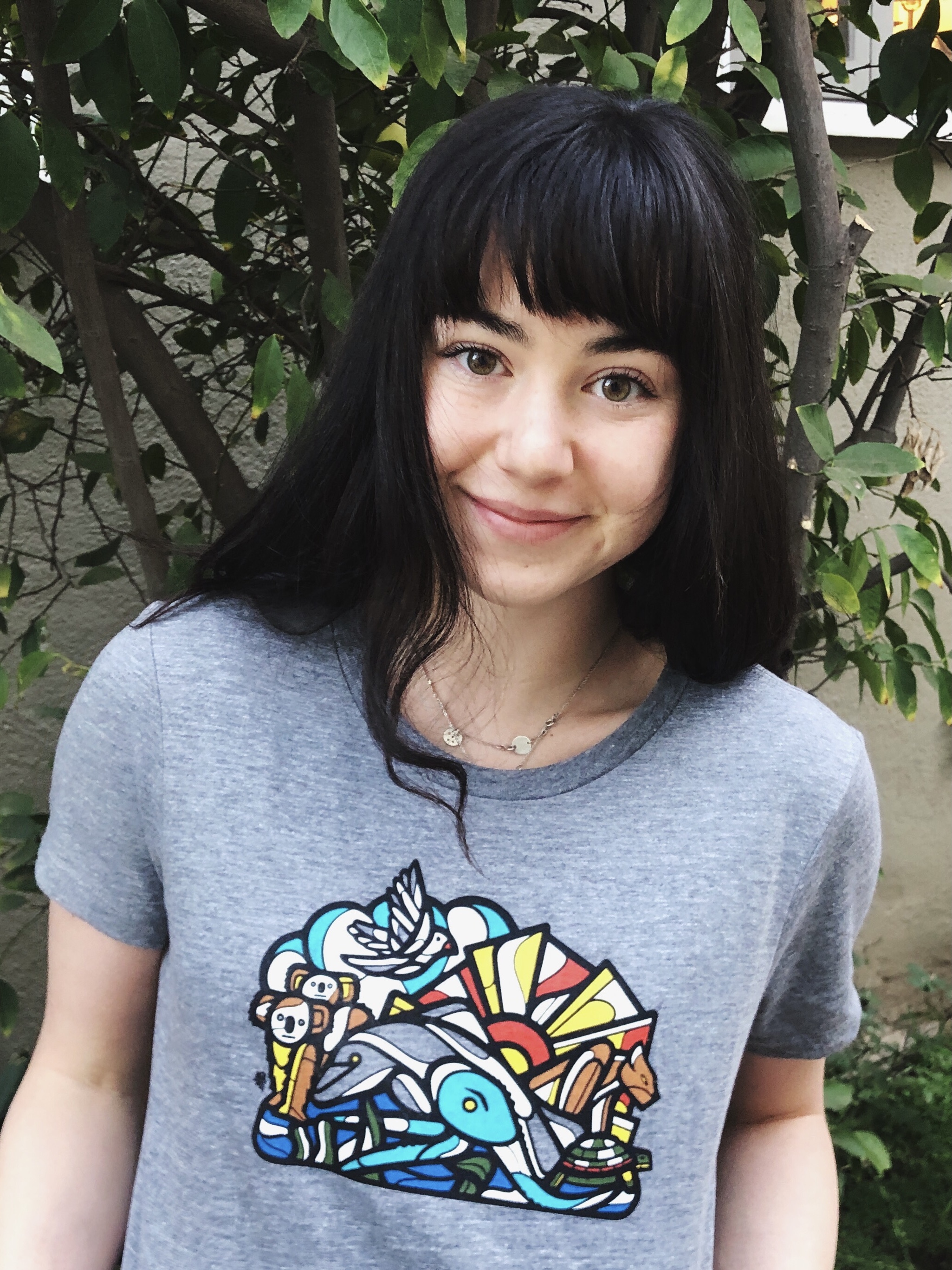 Sarah Gilman wearing a Mas Unidos shirt