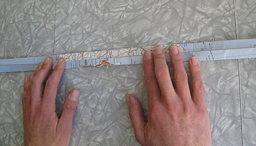 Maps Into a Paper basket