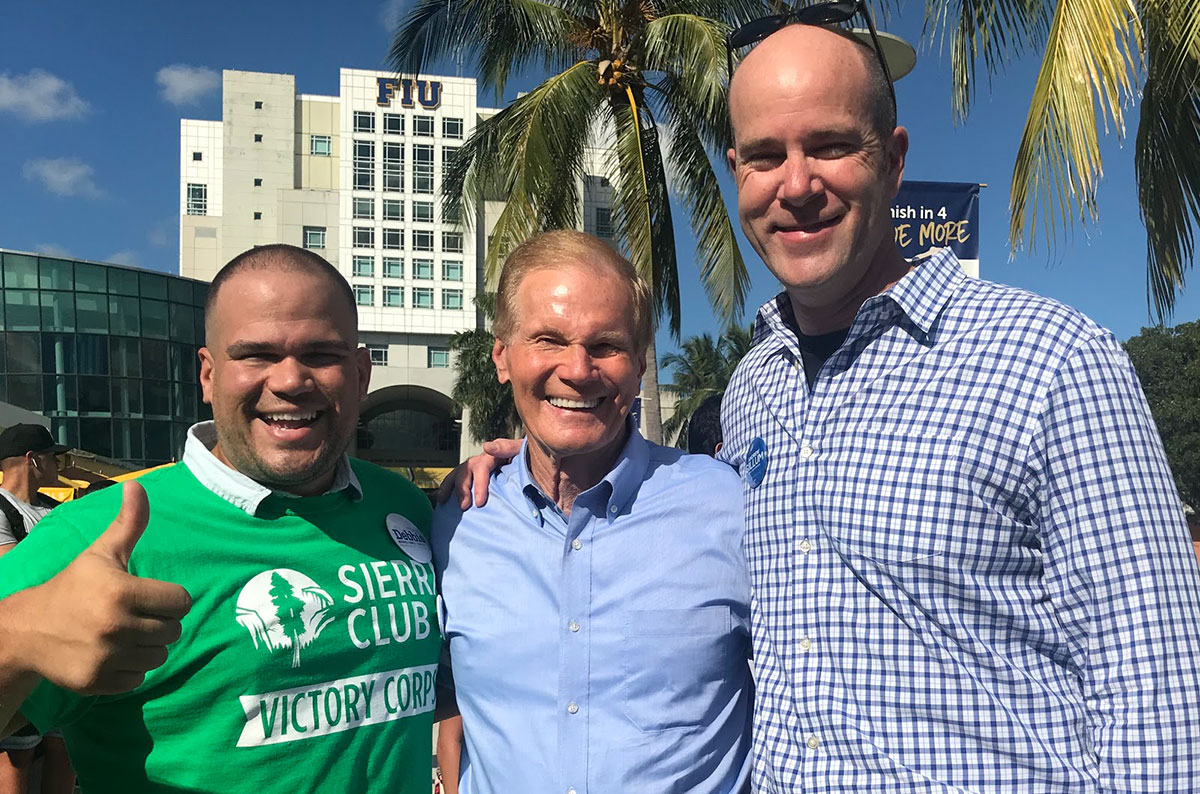 Left to right: Ricky Junquera, Senator Bill Nelson, Michael Brune