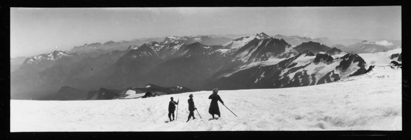 Three hikers in snow