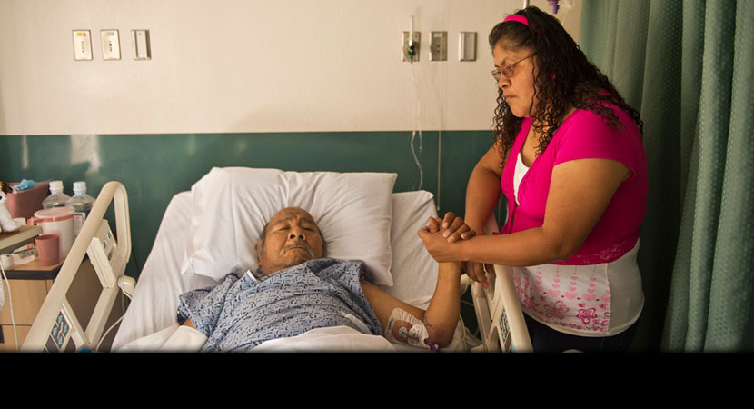 Jennifer Samson pays a hospital visit to her cousin Russell Samson, who died less than two weeks later. In a TV interview shortly before he was hospitalized, Russell said that power plant emissions had made him sick: "This got inside my chest, my lungs, w