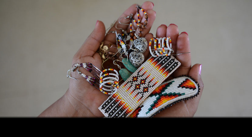 Jennifer Samson displays some jewelry given to her by her cousin Russell Samson, who died less than two weeks after this photo was taken.