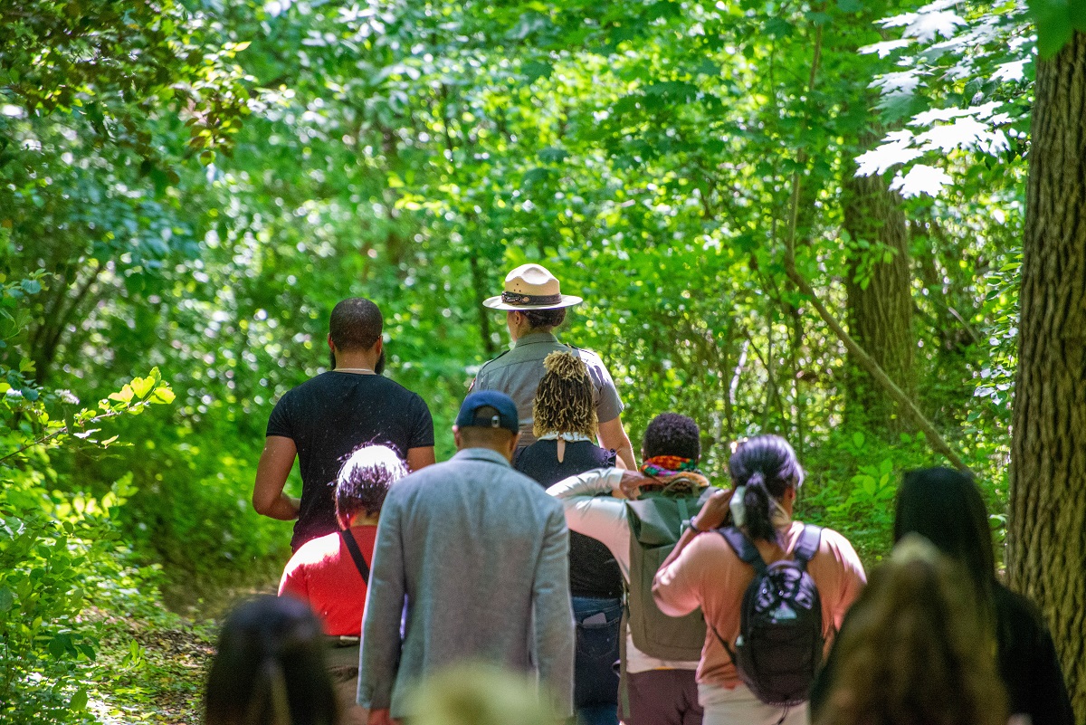 Youth environmental activists hike in Rock Creek Park in Washington, D.C. in May 2022.
