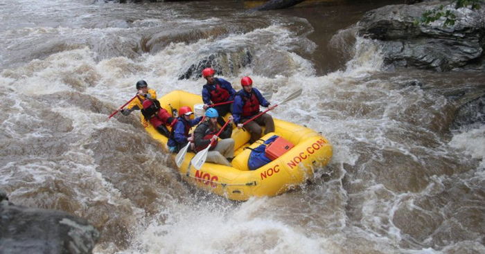 Whitewater rafting, Robert Vessels at right rear